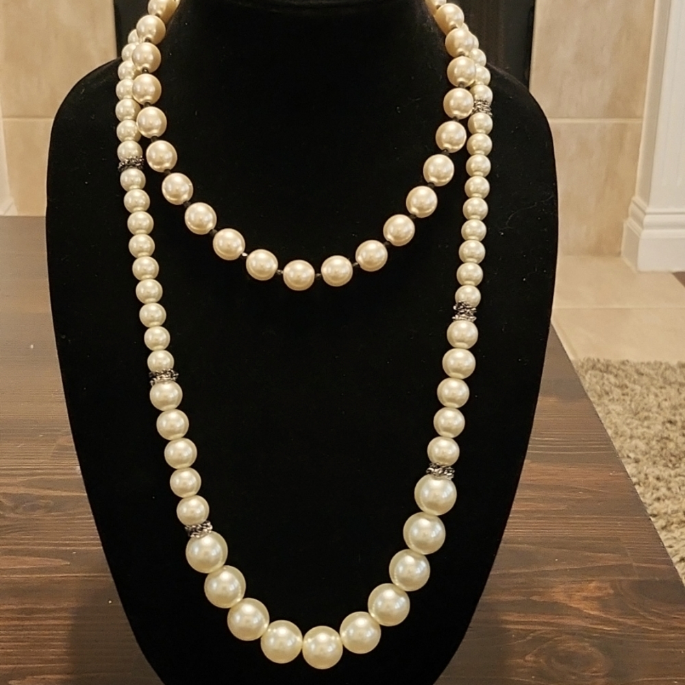 2 sets of faux pearls with satin ribbon tie